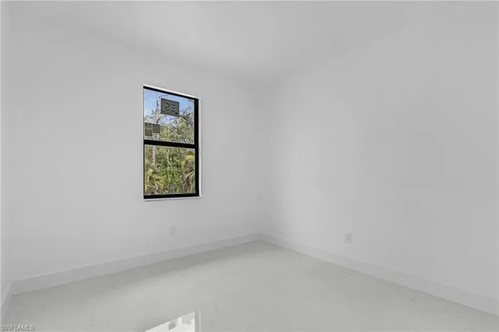 Unfurnished room with tile patterned floors