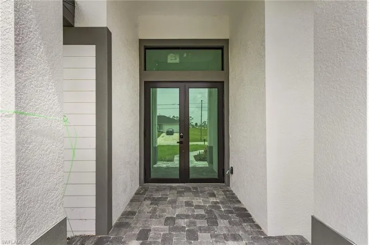 Entrance to property with french doors