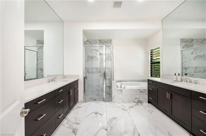 Bedroom featuring a ceiling fan, recessed lighting, and light wood-type flooring