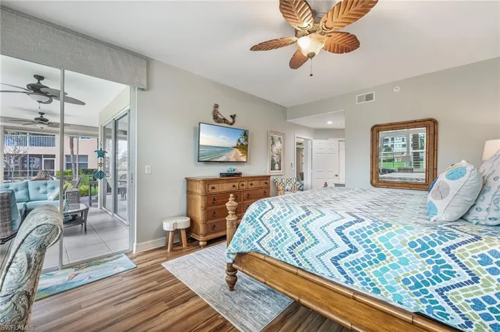 The primary suite offers direct access to the lanai.