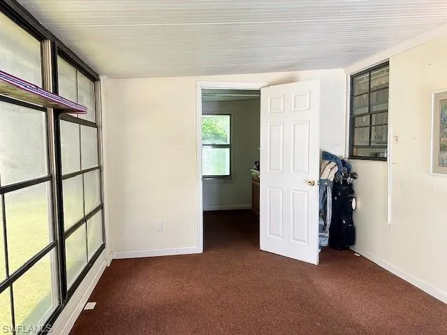 Spare room with carpet flooring