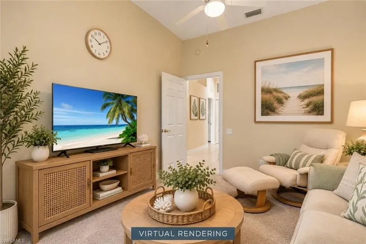 Vaulted ceiling featuring a central ceiling fan and neutral wall finish