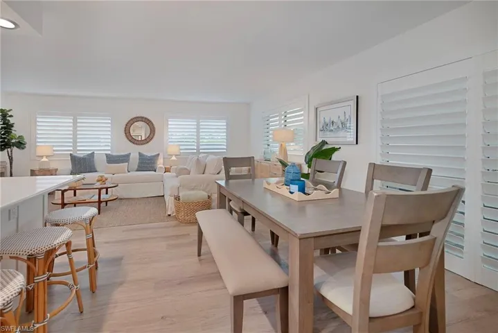 Dining area with light wood finished floors