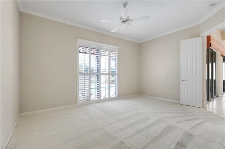 MB featuring light colored carpet, ceiling fan, ornamental molding, a smoke detector, and baseboards , and Plantation Sliders