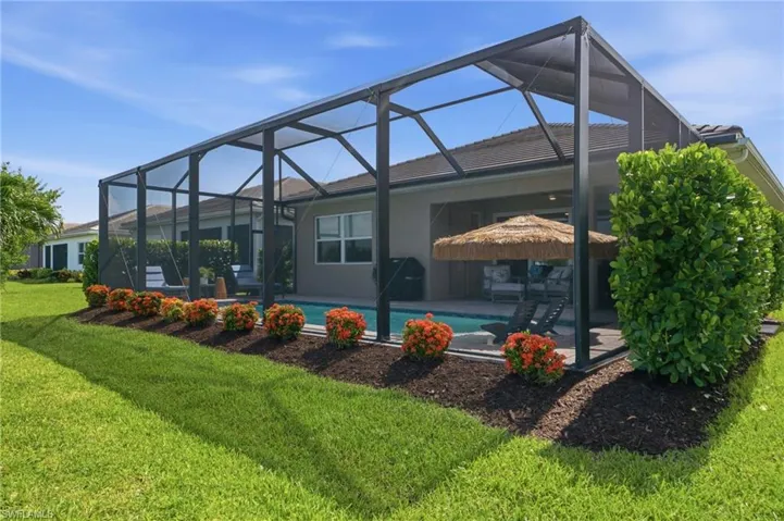 Screened in pool with sun shelf