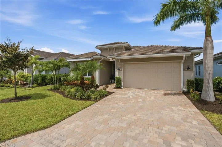 Entry, paved driveway, oversized 2 car garage