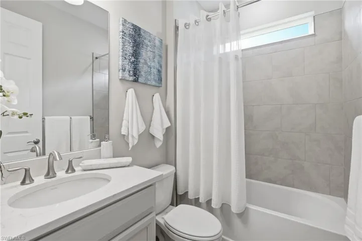 Guest full bathroom, wood look tile floor