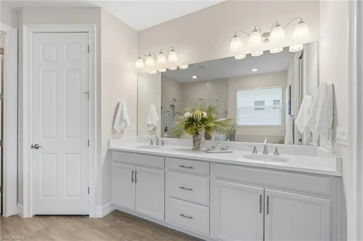 Dual sinks, private water closet