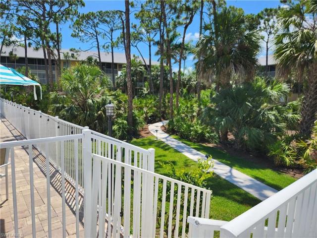 Fenced pool & winding walkways on property