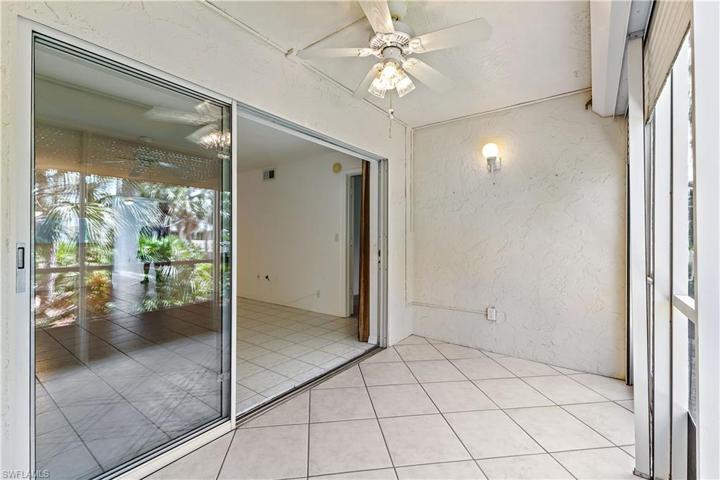 Screened lanai with electric storm shutters 2