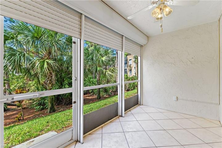 Screened lanai with electric storm shutters 1