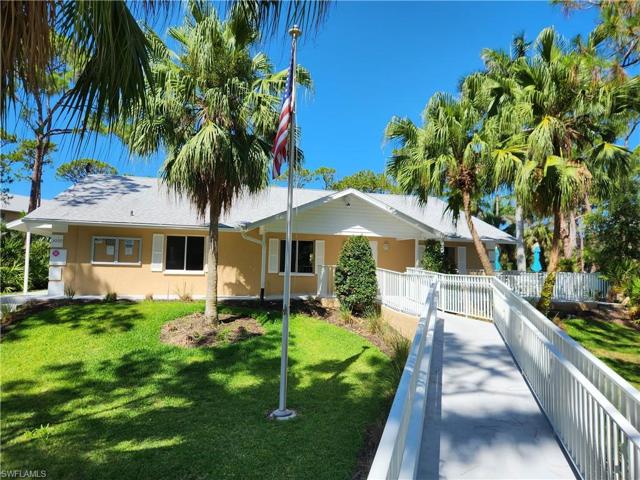 Walkway & ramp leading to clubhouse & large pool