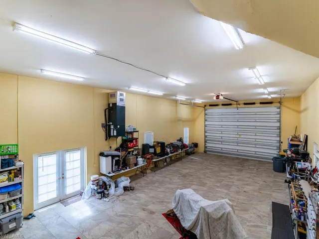 Garage featuring french doors