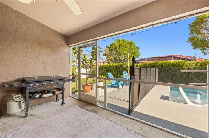 Doorway to outside with a textured wall