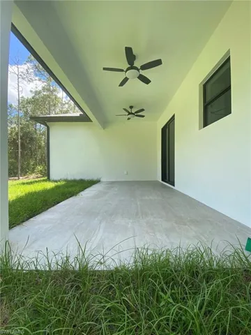 Trussed-in Tiled Spacious Lanai with Ceiling Fan