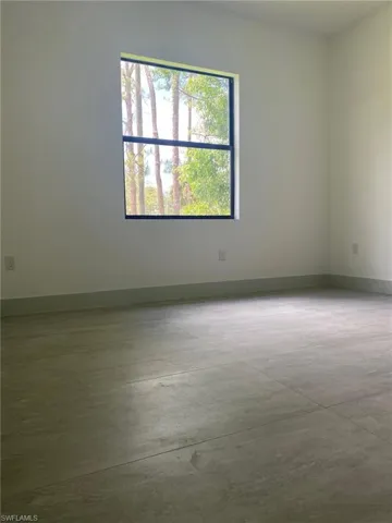 3rd Bedroom with ceiling fan and Plenty  floors