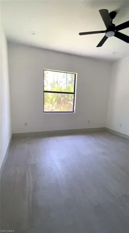 2nd Bedroom with ceiling fan and Plenty of Natural Light