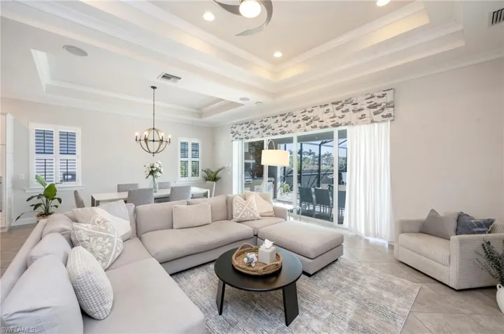 Impact glass windows throughout, pocketing sliding doors, plantation shutters on all the windows and custom valances
