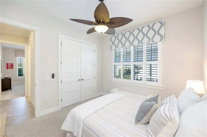 Detail on all bedroom closet doors, plantation shutters on all windows, ceiling fans in all bedrooms