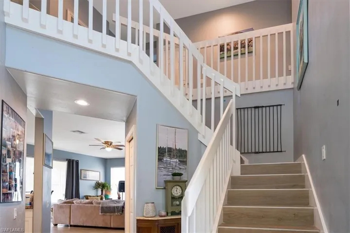 Grand-entry with white staircase