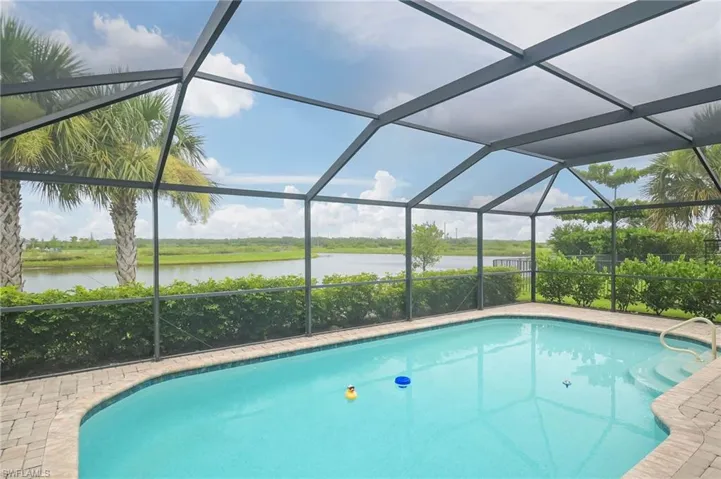 View of pool featuring a lanai