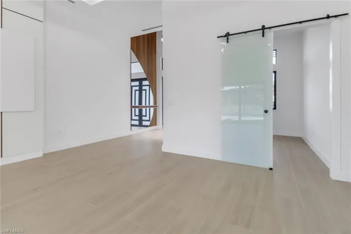 Frosted glass door to 4th bedroom/office.