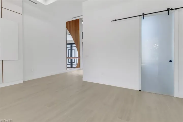Frosted glass door to 4th bedroom/office.