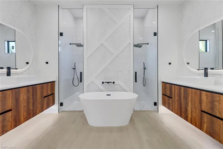 Owner's suite w/ dual hanging vanities and LED Illuminated Mirrors