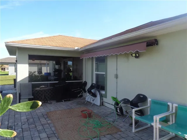 View of patio with area for grilling