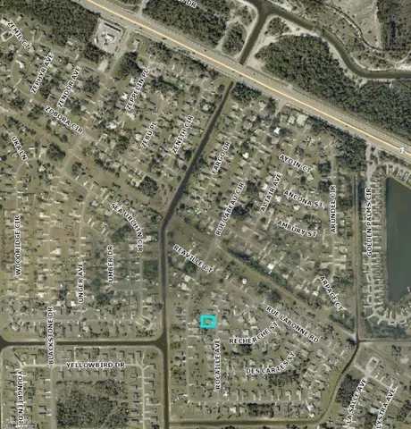 Satellite view of the property (marked with blue outlining) and surrounding neighborhood