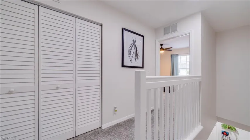 Laundry are behind louvered doors
