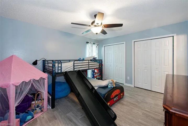 Bedroom with multiple closets