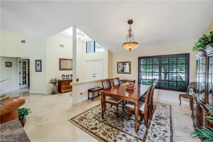 Dining area featuring light tile patterned floors