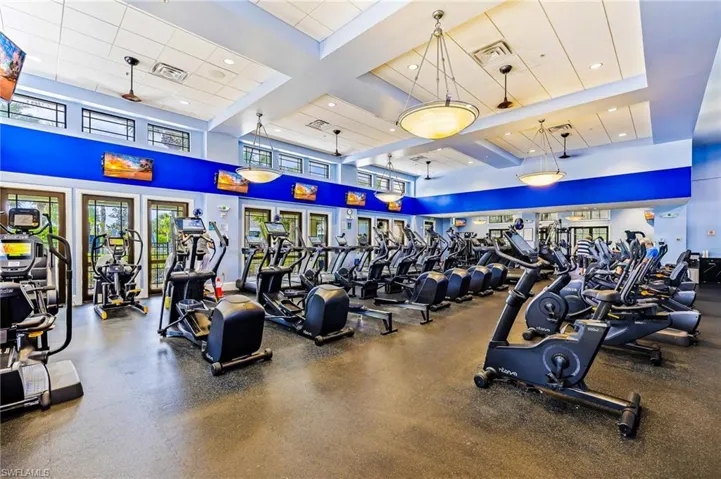 Exercise room featuring recessed lighting