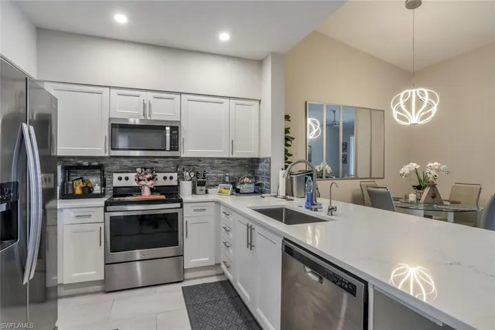 Quartz countertops, abundant cabinet space, updated appliances, and more!