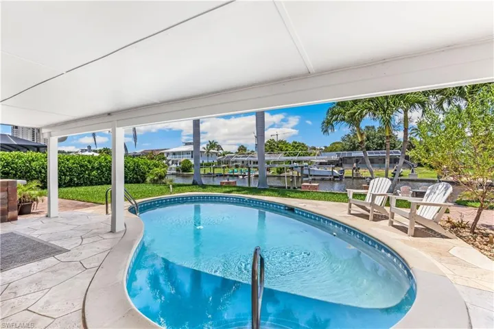 View of pool with a patio area