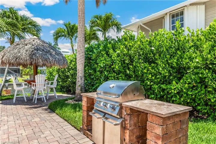 View of patio / terrace featuring exterior kitchen and grilling area