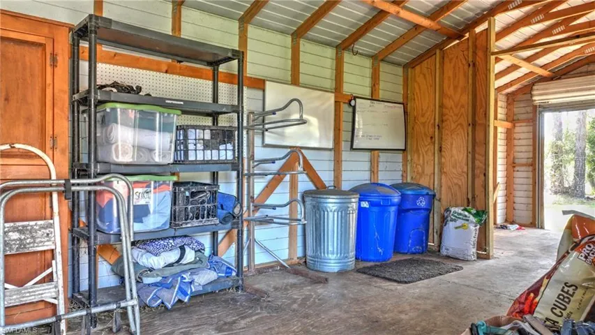 feed room with rollup door for hay