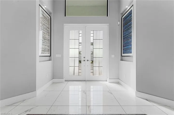 Entryway featuring french doors