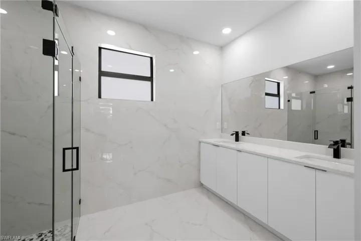 Bathroom with vanity and walk in shower