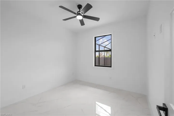 Unfurnished room with ceiling fan