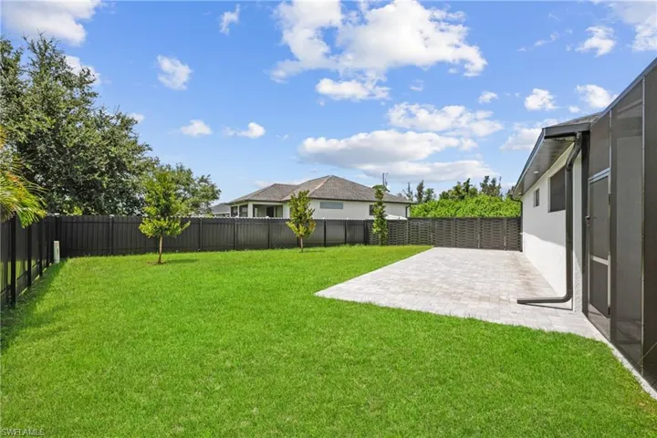 View of yard with a patio area