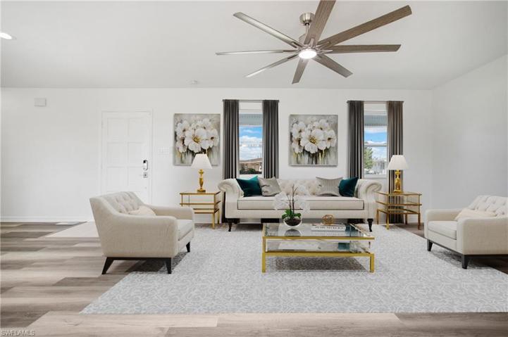 Photo includes reality staging to showcase the possibility of the living room. Design services included with purchase!