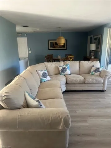 Living area featuring wood finished floors