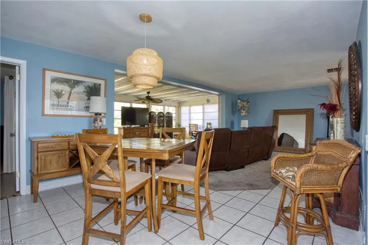 Dining room with light tile patterned floors