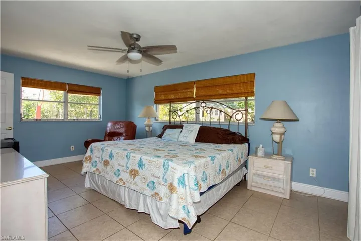 Bedroom featuring light tile patterned flooring