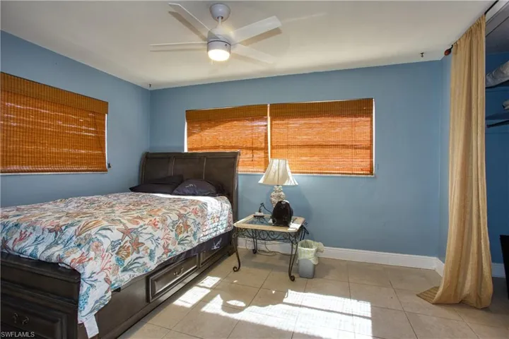 Bedroom featuring ceiling fan and light tile patterned floors