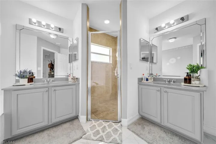Primary bath with dual sink vanity and walk in shower