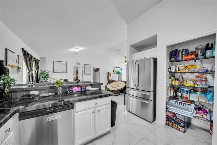 Stainless refrigerator and walk in pantry