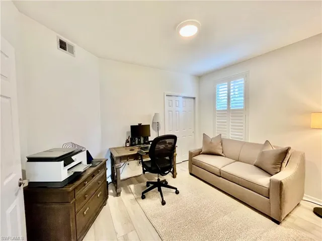 Office area with light wood finished floors